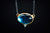 Oxidized Sterling Silver and 24k Yellow Gold Blue Topaz and Diamond Pendant